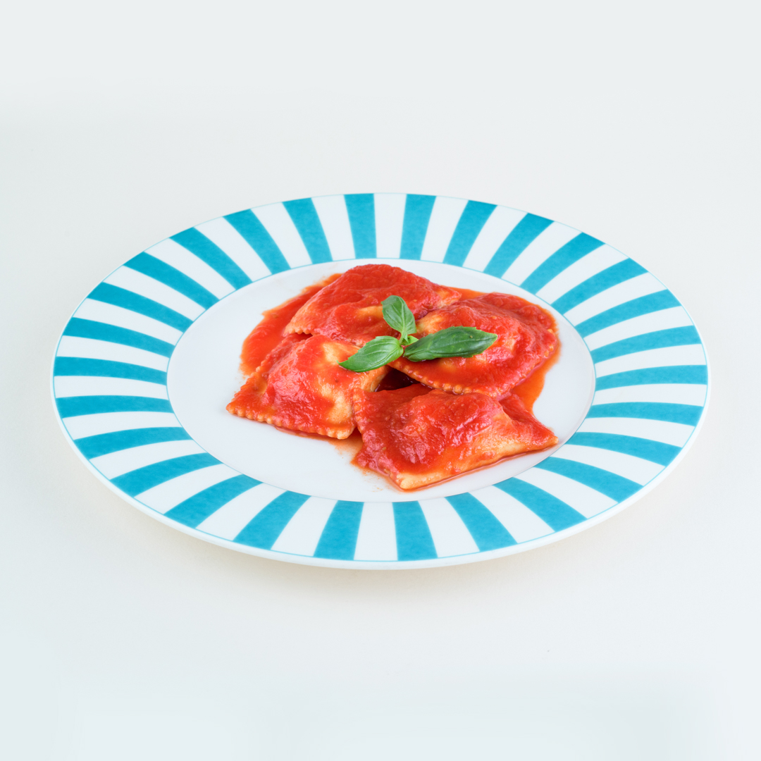 Ravioli con sugo cotto